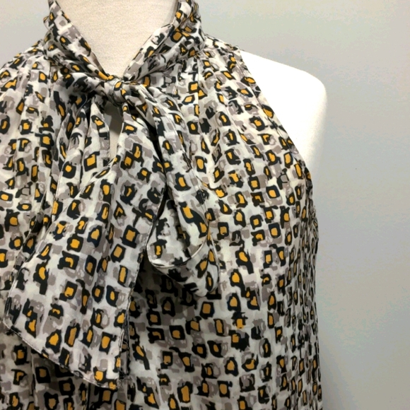 Chiffon sleeveless blouse - Picture 1 of 4